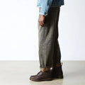 Person wearing green jeans and Dr Martens 6 eye 101 crazy horse brown boots on a white background.,
190665488418,
190665488425,
190665488449,
190665488456,
190665488463,, 46217, 46218, 190665488418, 190665488425, 190665488449, 190665488456, 190665488463, 46226, 46227