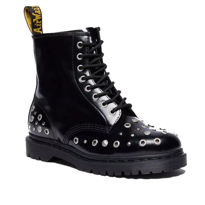 The Dr Martens 1460 Hardware HDW Buttero Leather Boot Black features shiny studded details, metal eyelets, black laces, and a yellow pull tab, all crafted from premium Buttero leather and shown on a white background.