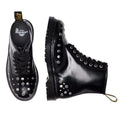Two Dr Martens 1460 Hardware HDW Buttero Leather Boots in black, each with shiny leather and silver studs on the toe, sides, and heel. One boot is top-viewed; one from the side. Both feature black laces and yellow pull tabs at the back., 49862, 190665797572, 190665797589, 190665797602, 49866, 49867, 49868, 49869