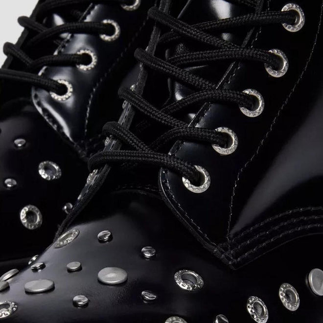 Close-up of Dr Martens 1460 Hardware HDW Buttero Leather Boot Black, featuring shiny black Buttero leather with silver studs, grommets, metal eyelets, and black laces—Goodyear welted for a bold, edgy statement., 49862, 190665797572, 190665797589, 190665797602, 49866, 49867, 49868, 49869
