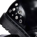 Close-up of the Dr Martens 1460 Hardware HDW Buttero Leather Boot in black, featuring round metallic studs, eyelets at the heel, a textured rubber sole, shiny Buttero leather, and sturdy Goodyear welted construction., 49862, 190665797572, 190665797589, 190665797602, 49866, 49867, 49868, 49869