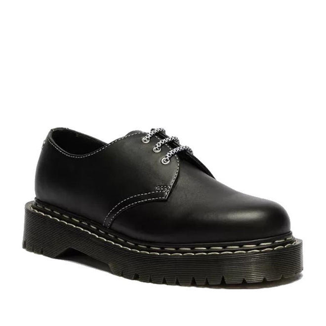 The Dr Martens 1461 Bex WDS White Stitching Black Sendal Oxford Shoe features a thick, ridged platform sole, white stitching, and silver eyelets. The shoe is shown at a slight angle against a white background.