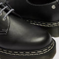 Close-up of the Dr Martens 1461 Bex WDS White Stitching Black Sendal Oxford Shoe, featuring a Bex platform sole, white stitching, black-and-white laces, polished black Sendal leather, and a metal rivet by the collar., 50357, 190665781496, 190665781502, 190665781526, 50362