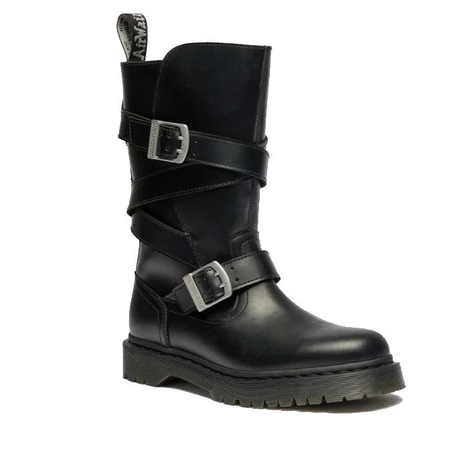 The Dr Martens Anistone Bex Strap High Boots feature black leather, a thick sole, silver buckles, ankle strap, biker-inspired details on a mid-calf shaft, and a pull tab for easy pull-on wear.