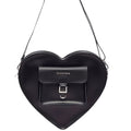 Image of right foot, side on of Dr Martens Large Big Heart Box Backpack Leather Black-Foot Forward Shoes