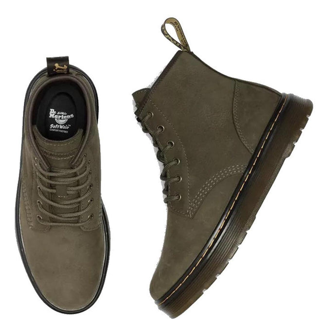A pair of Dr Martens Brookline Chukka Boot in olive milled nubuck leather; one boot is shown top-down with laces and branded insole, the other from the side showing sturdy stitching and a lightweight outsole., 51342, 190665797053, 190665797060, 190665797084, 190665797091, 190665797107, 190665797121, 51349