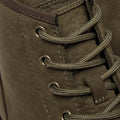 Close-up of the Dr Martens Brookline Chukka Boot in olive milled nubuck leather, featuring matching round laces through metal eyelets. The detailed leather texture and stitching show classic Dr. Martens inspiration., 51342, 190665797053, 190665797060, 190665797084, 190665797091, 190665797107, 190665797121, 51349