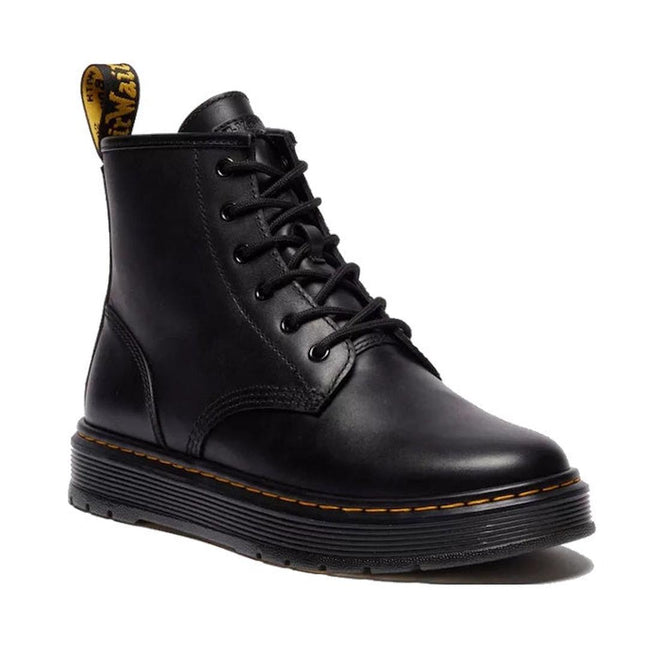 Right  foot dr martens brookline 6 eye Black leather boot with yellow stitching and a flat sole on a white background