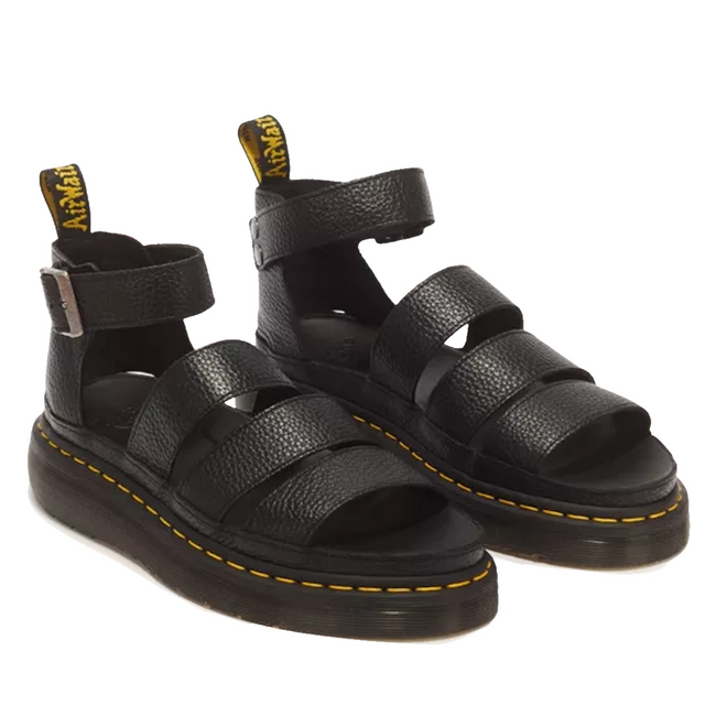 Dr Martens Clarissa II Quad Platform Sandal Black featuring black milled Nappa leather, a platform sole, three front straps, an ankle strap with a buckle, and yellow stitching along the sole.