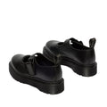 The Dr Martens Bex Indica II Mary Jane Tech Nappa Mono Black features thick, ridged soles, a single front strap with buckle, and branded pull tabs at the heel. Shown from a rear side angle., 190665804744, 190665804751, 190665804768, 190665804782, 190665804799, 190665804805, 50377