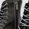 Close-up of Dr Martens Jadon WDS White Stitching Hardware 8 Eye Boot Black, featuring black Sendal leather, white stitching, patterned laces, metal eyelets, side zipper with branded pull tab—an iconic platform silhouette., 50347, 50348, 190665775471, 190665775488, 190665775501, 50353, 50354, 50355, 50356