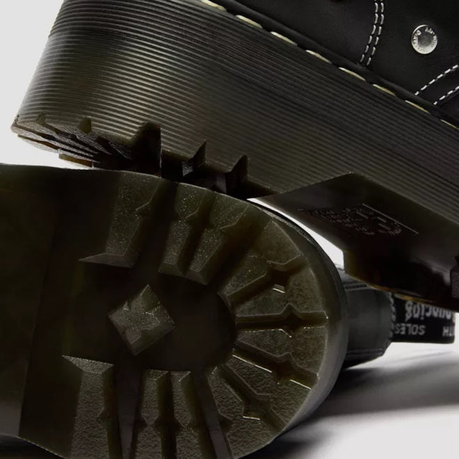 Close-up of the sole and stitching details on Dr Martens Jadon WDS White Stitching Hardware 8 Eye Boot Black, showcasing the thick, grooved platform silhouette and distinctive white stitching., 50347, 50348, 190665775471, 190665775488, 190665775501, 50353, 50354, 50355, 50356