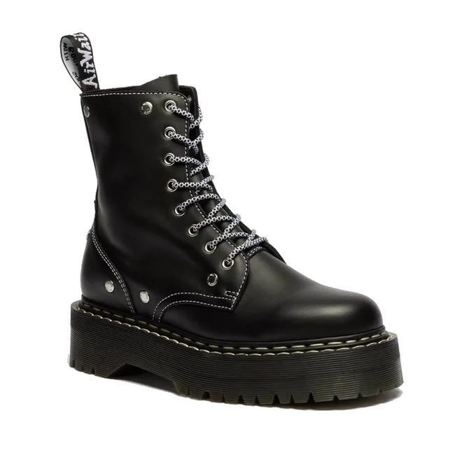 The Dr Martens Jadon WDS Black Boot features silver eyelets, thick platform sole, white contrast stitching, and a branded pull tab at the heel.