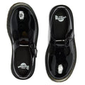 Top view of Dr Martens kids Polley II Heart T Bar Junior Black Patent shoes with shiny black patent leather, thick yellow-stitched soles, and buckle straps, placed side by side on a white background., 50432, 50433, 190665786743, 190665786750, 190665786651, 190665786675, 190665786699
