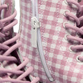 Close-up of Dr Martens kids - 1460 J Juniors Gingham Pink Lace Up Boot with zip, featuring a pink and white gingham pattern, detailed stitching, white laces, eyelets, and a stylish 8-eye boot design., 50424, 50425, 50426, 190665779165, 190665779066, 190665779080, 190665779103