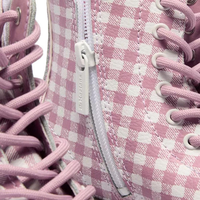 Close-up of Dr Martens kids - 1460 J Juniors Gingham Pink Lace Up Boot with zip, featuring a pink and white gingham pattern, detailed stitching, white laces, eyelets, and a stylish 8-eye boot design., 50424, 50425, 50426, 190665779165, 190665779066, 190665779080, 190665779103
