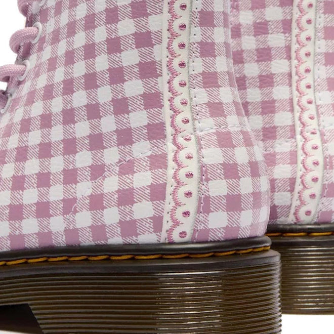Close-up of the Dr Martens kids 1460 J Juniors Gingham Pink Lace Up Boot with zip, showing pink gingham pattern, decorative stitching, brown soles with yellow stitching, and classic 8-eye design., 50424, 50425, 50426, 190665779165, 190665779066, 190665779080, 190665779103
