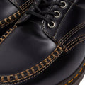 Close-up of the Dr Martens Lowell Moc Toe Black Leather Shoe, featuring black Analine leather, thick brown stitching, metal eyelets for laces, and Goodyear welted construction that showcases exceptional craftsmanship., 50395, 50396, 50397, 50398, 50399, 190665668940, 190665668957, 190665668971, 190665668988, 50404