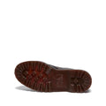 The image shows the sole of a Dr Martens Lowell Moc Toe Black Leather Shoe, featuring a dark brown tread with deep, rugged lugs for traction. The background is plain white., 50395, 50396, 50397, 50398, 50399, 190665668940, 190665668957, 190665668971, 190665668988, 50404