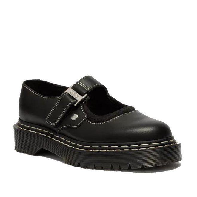 The Dr. Martens Women's Mary Jane WDS Bex features black Sendal leather, a thick ridged platform sole, Goodyear Welted construction, white double stitching, and a buckle strap across the top.