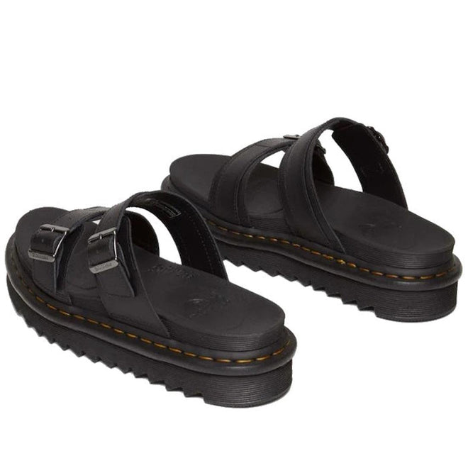 A rear shot of a pair of Dr Martens Black leather pper Myles Slides sandale showing the moulded footbed and yellow stitching around the sole.,
190665653779,
190665653786,
190665653793,
190665653816,
190665653823,
190665653830,