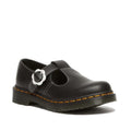 Image of right foot, side on of Dr Martens Polley T-BarBlack Leather White Flower Buckle-Foot Forward Shoes