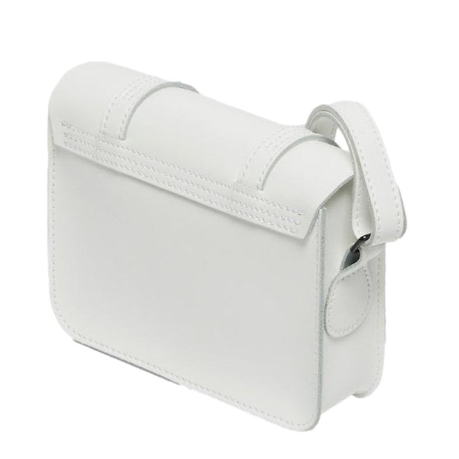 The Dr Martens Leather Cross Body White Leather Box Satchel is a minimalist, structured mini bag with a flap closure, visible stitching, and single shoulder strap—an ideal choice for fans of Dr. Martens’ signature style., 190665390384
