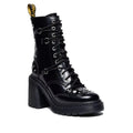 Dr Martens Chesney Heeled Hardware Black leather boot with chunky flared heel 10 up and decorative studs on a white background. Has a lace but also a zip on the inside leg.,