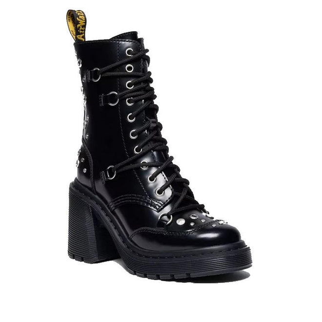 Dr Martens Chesney Heeled Hardware Black leather boot with chunky flared heel 10 up and decorative studs on a white background. Has a lace but also a zip on the inside leg.,