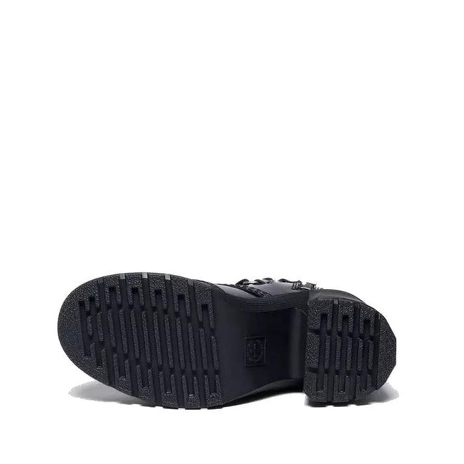 Black shoe sole of Dr Martens Chesney heeled boot on a white background.,
190665797701,
190665797718,
190665797732,, 49579, 190665797701, 190665797718, 190665797732, 49583, 49584, 49585, 49586