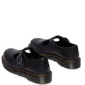 A rear heel shoe of a pair of black Dr Martens Polley T Bar  shoes with buckles on a white background.,
190665740530,
190665740547,
190665740561,
