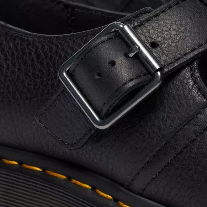 Close-up of the buckle and leather detail of Dr Martens Polley T Bar leather shoe with a buckle .,
190665740530,
190665740547,
190665740561,