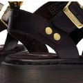 Close-up of Dr Martens Gryphon Sandal Black Atlas Leather with gold-tone buckles and rivets, thick ridged sole, Goodyear welted construction, and branded tag., 190665783414, 190665783421, 190665783438, 190665783452, 190665783469, 50536