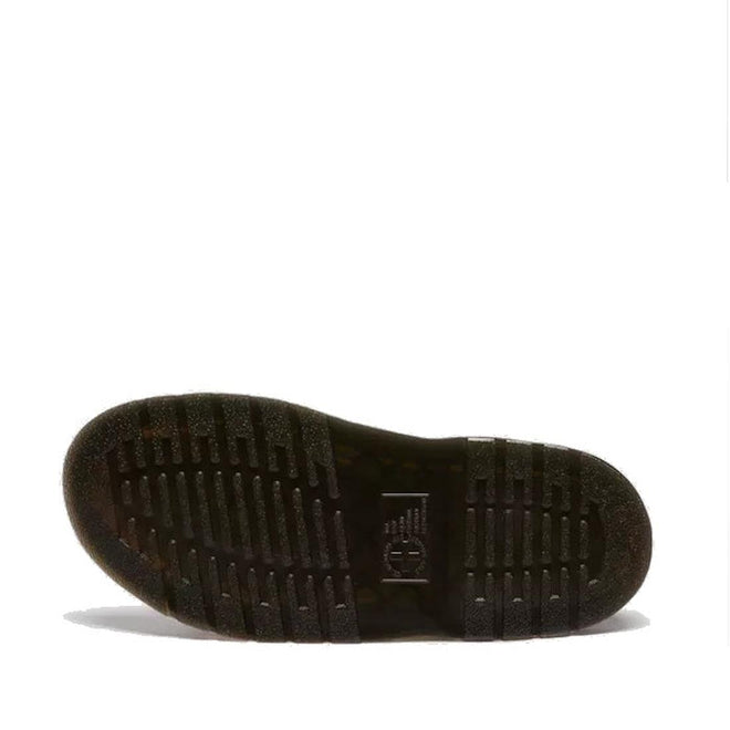 The image displays the black rubber sole of the Dr Martens Gryphon Sandal Black Atlas Leather, viewed from underneath. The tread has horizontal and vertical grooves, with a central logo and text, all against a plain white background., 190665783414, 190665783421, 190665783438, 190665783452, 190665783469, 50536