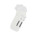 A pair of Dr Martens Ankle Frill Cotton Blend Socks in white, made from a cotton blend with a frilled lace trim at the top and Dr. Martens branding on the sides, laid flat on a white background.