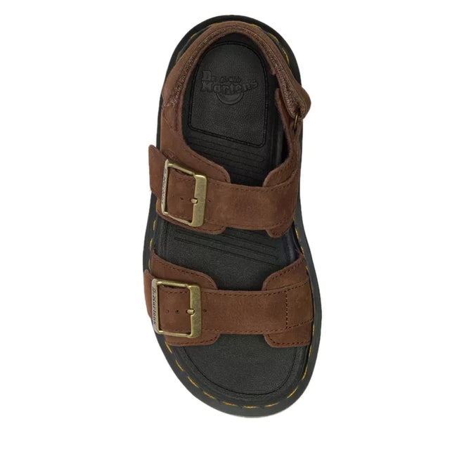 The Dr Martens Zebzag Sepia Brown Nubuck 2 Strap Sandal features milled nubuck leather, two large brass buckles, visible yellow stitching around a black sole, and a water-resistant design. Shown from a top-down view., 190665790603, 190665790610, 190665790627, 190665790641, 190665790658, 190665790665