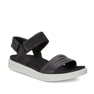 The Ecco Flowt Black Womens Active Sandal is a sleek, minimalist sandal with a thick white sole, wide toe strap, and adjustable ankle strap with velcro—perfect for everyday wear.