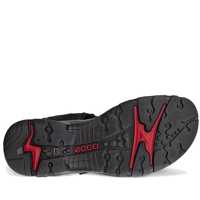 The image shows the black rubber sole of the ECCO Offroad Full Black Women's Active Sandal Back Strap, with red accents and a central red ECCO logo. The tread's circular and wavy patterns provide superior traction and walking comfort., 737426010756, 737426010763, 737426010770, 737426010787, 737426010794, 737426010800, 737426010817, 737429104469