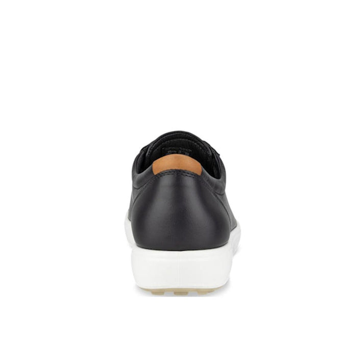 The Ecco Soft 7 Sneakers Black Womens Leather shoe is shown from the back, with a white sole and a small tan heel accent, set against a plain white background., 41661, 737431676282, 737431676299, 737431676305, 41665