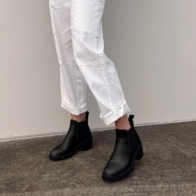 A shot of a model wearing the EMU Clara black leather chelsea  waterproof boot.,
9330071927755,
9330071927762,
9330071927779,
9330071927786,