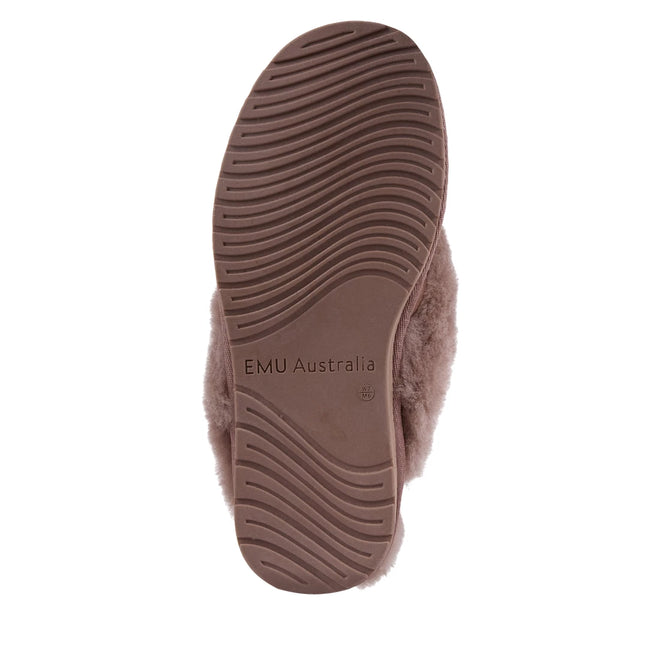 The EMU Women's Jolie Mocha Slipper Scuff Sheepskin features a brown rubber sole with wavy tread patterns and “EMU Australia” embossed in the center. Its durable design makes these slippers ideal for both indoor and outdoor wear., 51650, 9330071975503, 9330071975510, 9330071975527, 9330071975534, 51655