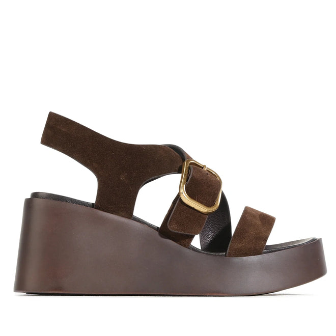 EOS Arianis Chestnut Brown Women’s Suede Leather Wedge Sandals displayed in a side profile against a white background, featuring an open toe, ankle strap with gold buckle, thick platform sole, and an anatomical footbed for enhanced comfort., 54254, 9321190083521, 9321190083538, 9321190083545, 9321190083552, 9321190083569, 54260