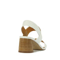 The EOS Peto White Leather Sandal features a criss-cross strap, back strap, and medium stacked block heel—minimalist heels ideal for the modern businesswoman. Shown from the back on a plain white background., 49562, 49563, 49564, 49565, 49566, 49567