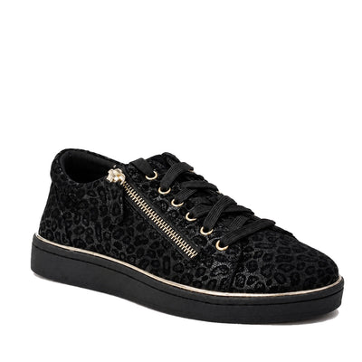 The Gelato Grapevine Leopard Womens Suede Embossed Sneaker in black features a leopard print, black laces, gold-accented side zip, and a thick black sole with metallic gold trim—an eye-catching addition to your casual sneaker collection.