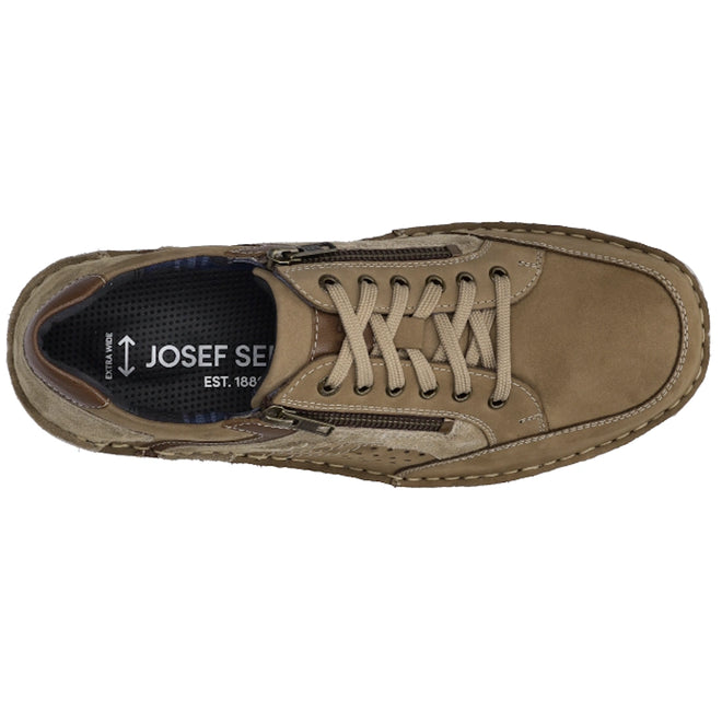 Top view of the Josef Seibel New Anvers 87 Men’s Casual Shoe w/Zip in Beige Sand, featuring a tan nubuck leather upper with beige laces, a visible side zipper, and detailed stitching. This comfortable walking shoe includes an insole with brand text and an upward-pointing arrow.