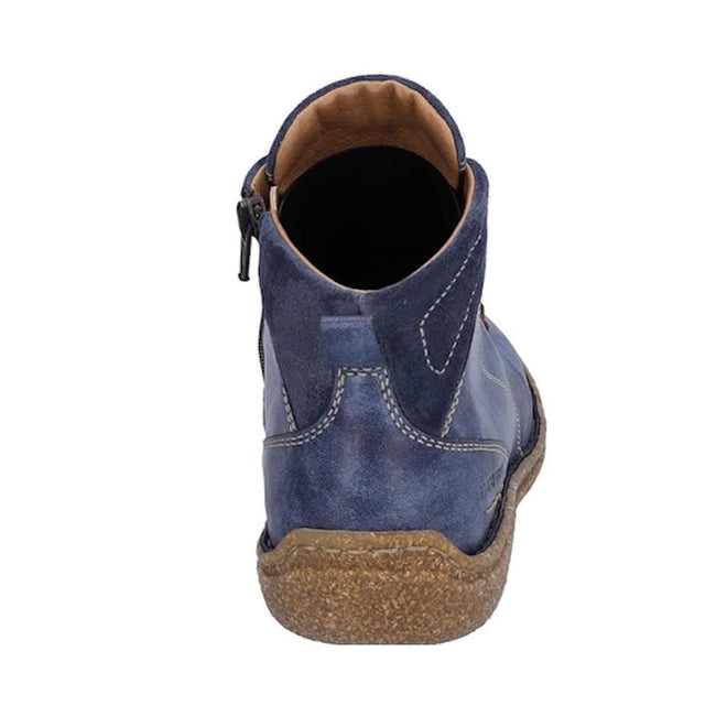 The Josef Seibel Neele 57 Women's Leather Ankle Boot in Ocean Blue features a side zip, comfy leather, light brown lining, white stitching, removable footbed, and textured brown sole—ideal for daily wear against a white background., 4062838400144, 4062838400151, 4062838400168, 50811, 4062838400182, 4062838400199