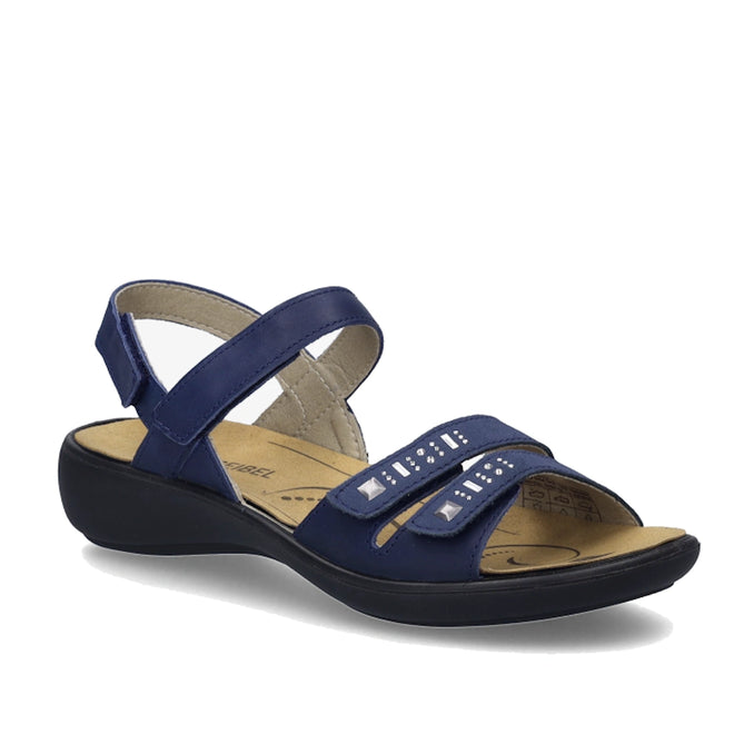Step into comfort and style with the Josef Seibel Ibiza 86 Women’s Leather Comfort Sandal in Ocean Blue. These sandals feature an open-toe design, two front straps embellished with silver studs, and a convenient velcro ankle strap. A low black heel and light tan sole with visible arch support ensure they’re perfect for all-day wear.