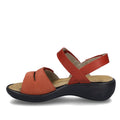 A single red open-toe sandal with a low black wedge heel, featuring two straps across the top, a strap behind the heel, and a tan cushioned insole—this chic design is the Josef Seibel Ibiza 86 Womens Leather Comfort Sandal Rot Red, known for delivering comfort and versatility in women’s footwear., 53187, 4062838863208, 4062838863215, 4062838863222, 53191, 53192