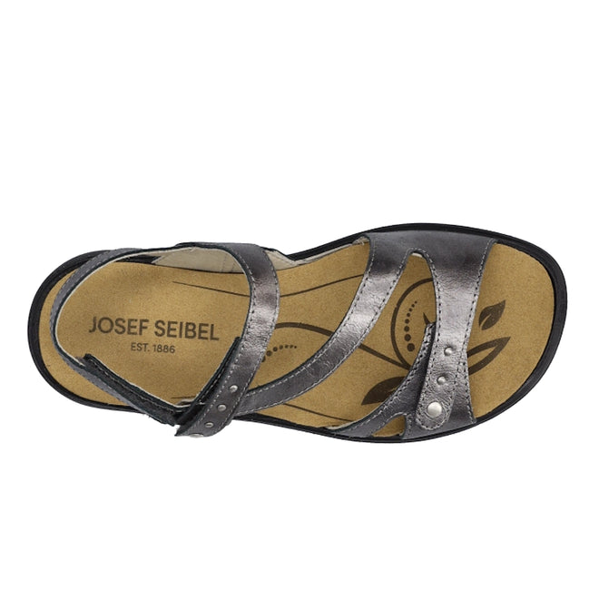 A top view of the Josef Seibel Ibiza 70 Womens Leather Comfort Sandal Anthrazit Pewter showcases a metallic finish with three straps, decorative stitching, and a velcro closure. The tan insole features the Josef Seibel logo along with an elegant leaf pattern print., 53175, 4062838861907, 4062838861914, 4062838861921, 53179, 53180
