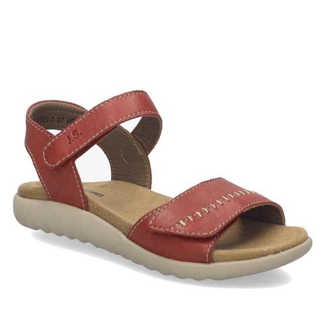 A single Josef Seibel Juliet 03 Womens Leather Comfort Sandal is shown in red leather with a beige sole, featuring a Velcro ankle strap and visible white stitching. This women’s sandal has an open toe and heel design, and is displayed on a plain white background.